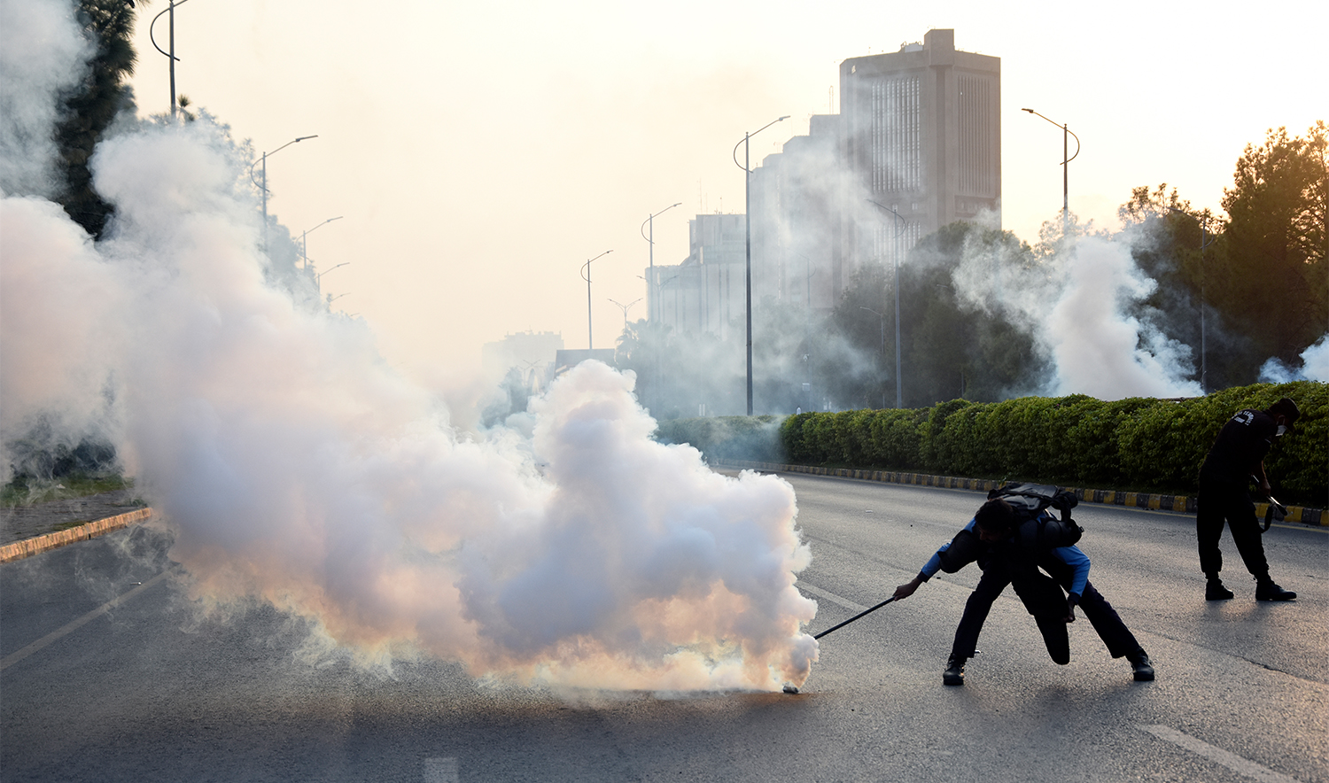 Police officers fire tear gas to disperse the supporters of imprisoned former Prime Minister Imran Khan's party Pakistan Tehreek-e-Insaf during a protest in Islamabad, Pakistan, on October 4, 2024. (AP)
