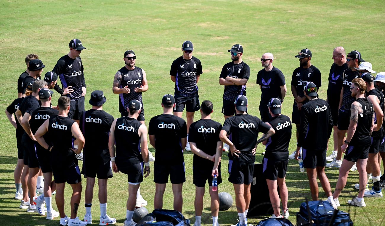 England's head coach Brendon McCullum (back 2L) geatures as he speaks to players during a practice session ahead of their first Test cricket match against Pakistan at the Multan Cricket Stadium in Multan on October 5, 2024. (AFP)