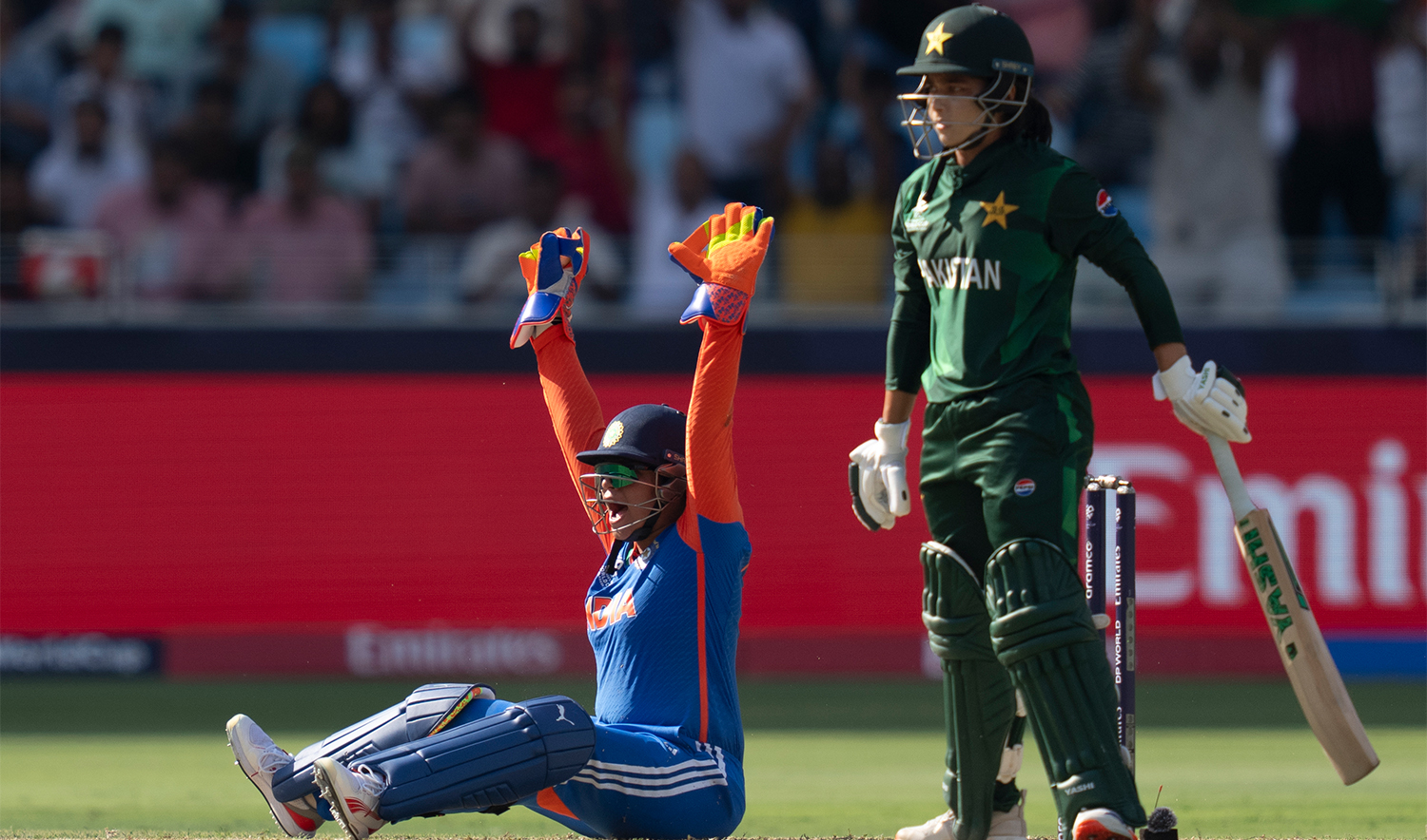 ndia's wicketkeeper Richa Ghosh, left, appeals successfully for the wicket of Pakistan's captain Fatima Sana during the ICC Women's T20 World Cup 2024 match between Pakistan and India at Dubai International Stadium, United Arab Emirates, on October 6, 2024. (AP)