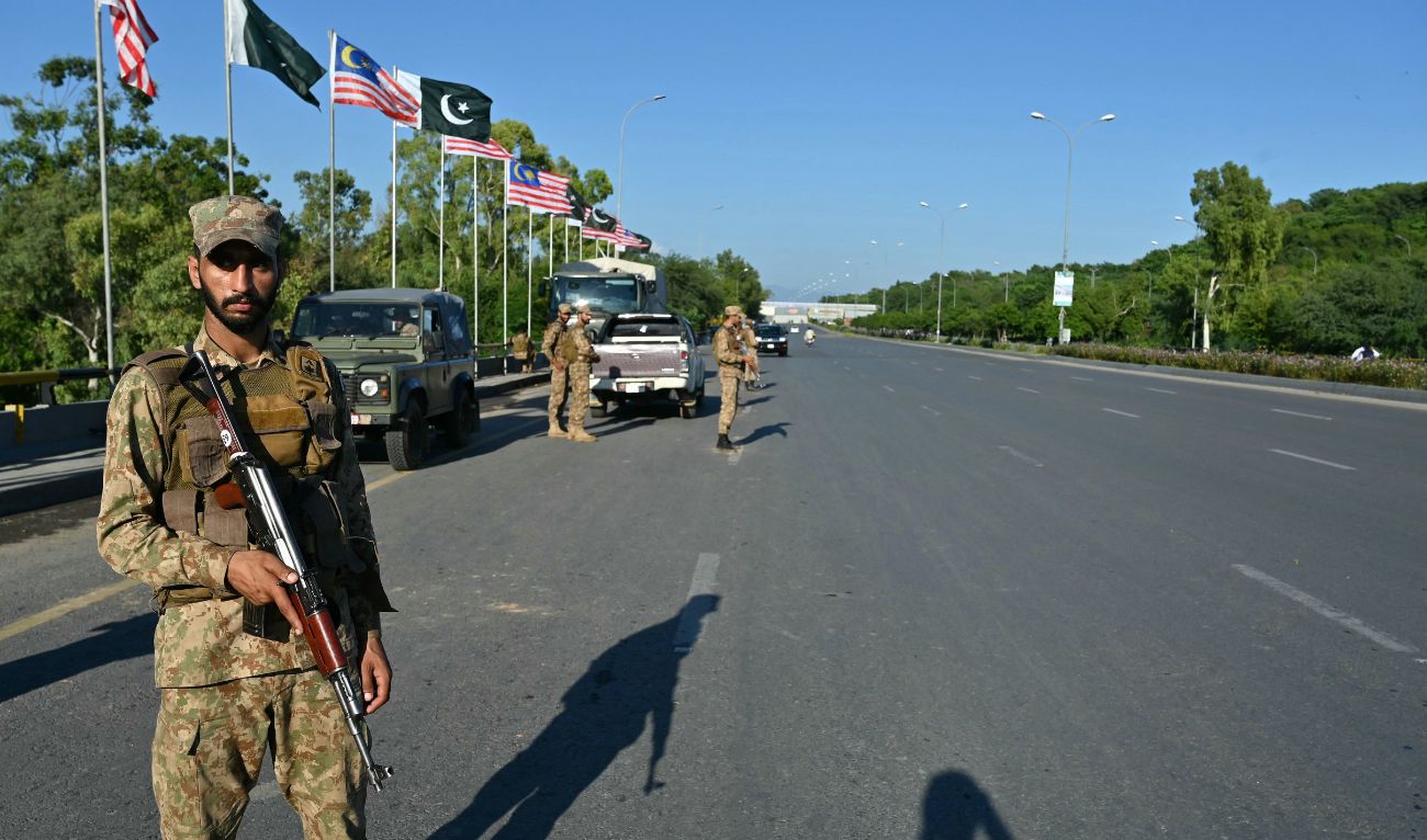 Pakistan Army soldiers stand guard in anticipation of former Prime Minister Imran Khan's supporters and activists amid the ongoing protests in Islamabad on October 6, 2024. (AFP)