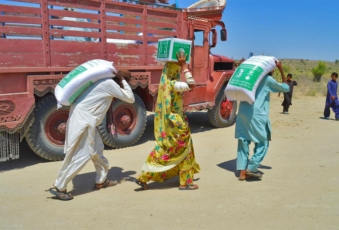 Beneficiaries receive food packages from KSRelief in Pakistan on April 6, 2022. (Saudi Embassy in Pakistan/File)