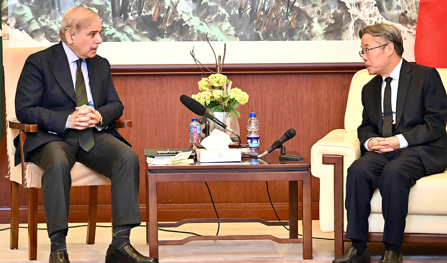 Pakistan Prime Minister Shehbaz Sharif (left) meets the Chinese Ambassador, Jiang Zaidong, at the Embassy of the People's Republic of China, in Islamabad on October 7, 2024. (Government of Pakistan)