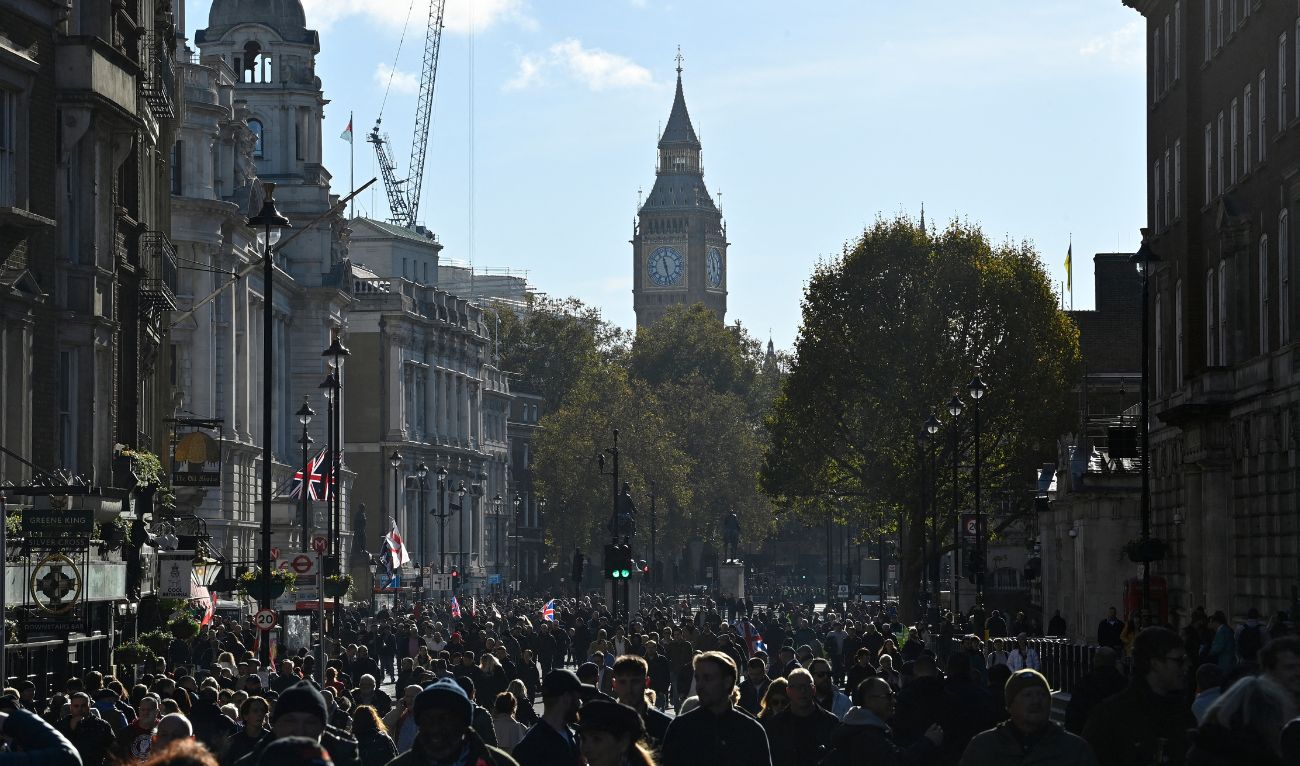 Crowds walk up Whitehall after the two minutes silence in central London on November 11, 2023. (AFP)