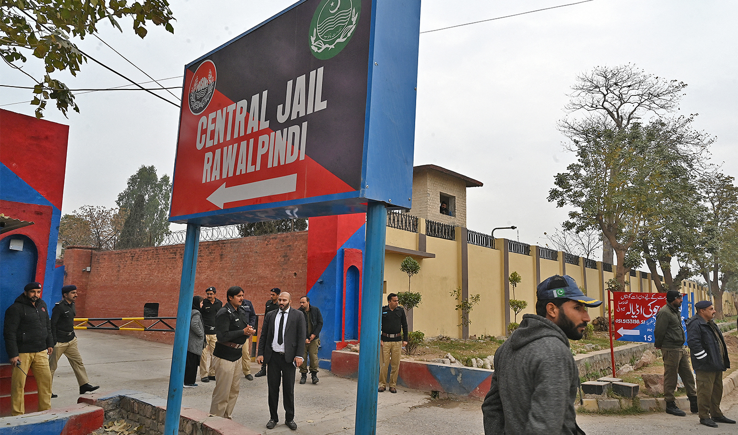 Police personnel stand outside the entrance of Adiala jail during the hearing of jailed former Pakistan's Prime Minister Imran Khan, in Rawalpindi on January 30, 2024. (AFP/File)