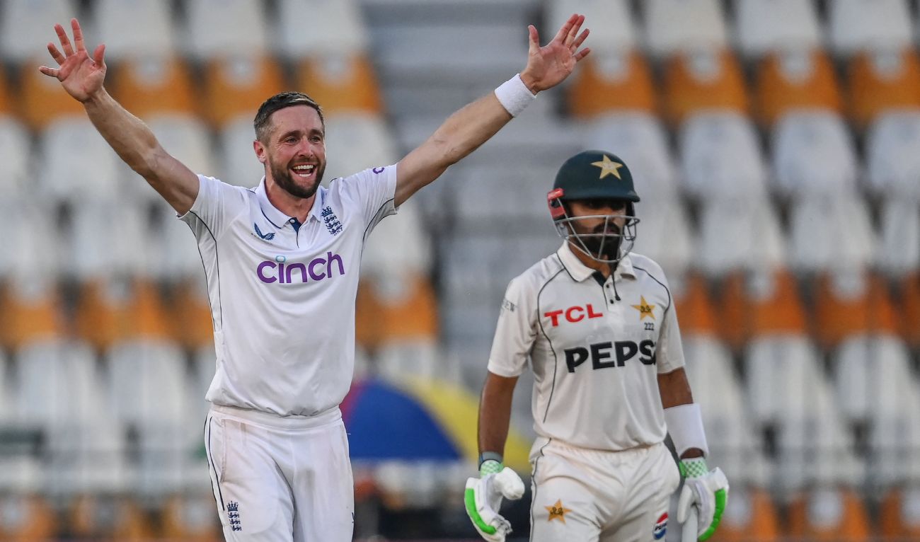 England's Chris Woakes successfully appeals for leg before wicket (LBW) against Pakistan's Babar Azam (R) during the first day of the first Test cricket match between Pakistan and England at the Multan Cricket Stadium in Multan on October 7, 2024. (AFP/ File)