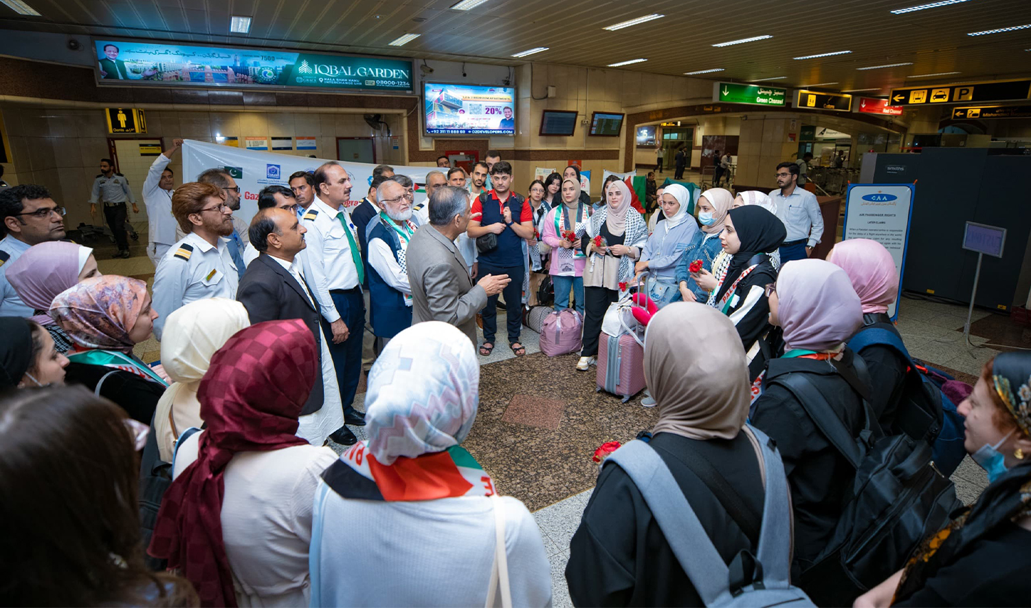 The first batch of 27 Palestinian medical students arrive at Allama Iqbal International Airport in Lahore, Pakistan, on October 14, 2024. (Al-Khidmat Foundation)