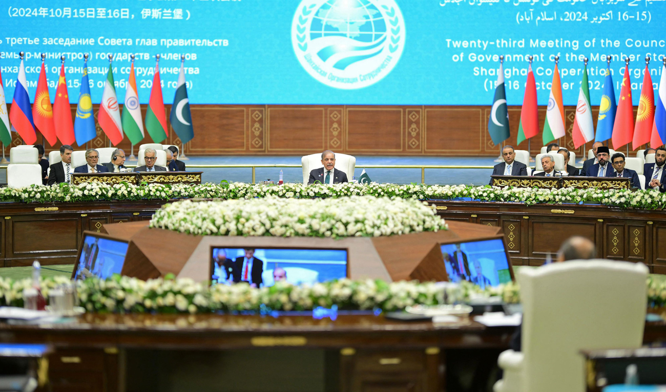 This handout photograph taken on October 16, 2024 and released by Pakistan's Press Information Department (PID) shows Pakistan's Prime Minister Shehbaz Sharif (C) addressing the Shanghai Cooperation Organisation (SCO) summit, in Islamabad. (AFP)