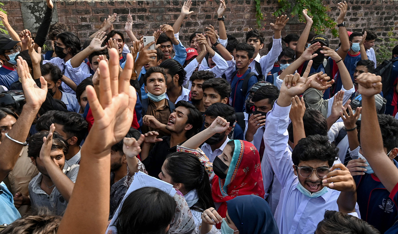 Students carry placards as they march during a demonstration to condemn the alleged rape of a female student in Lahore on October 16, 2024. (AFP)