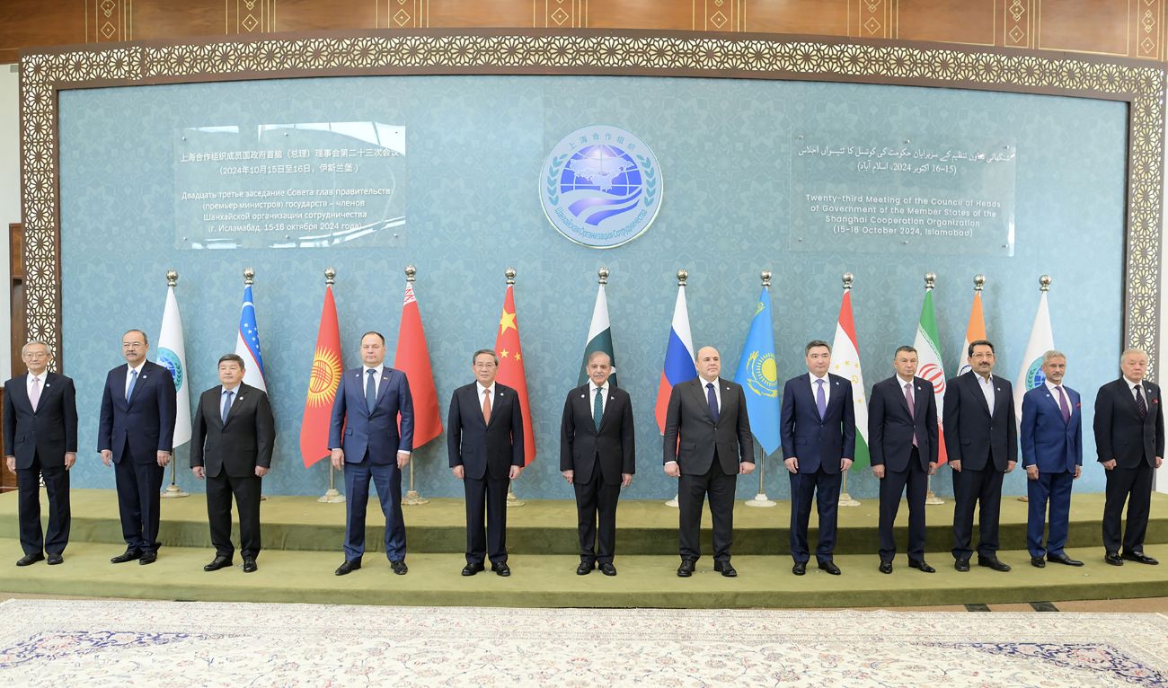 This handout photograph taken on October 16, 2024 and released by Pakistan's Press Information Department (PID) shows Pakistan's Prime Minister Shehbaz Sharif (C front) posing for a group picture with the heads of the delegate members during the Shanghai Cooperation Organisation (SCO) summit, in Islamabad. The SCO comprises China, India, Russia, Pakistan, Iran, Kazakhstan, Kyrgyzstan, Tajikistan, Uzbekistan and Belarus -- with 16 more countries affiliated as observers or "dialogue partners". (AFP)