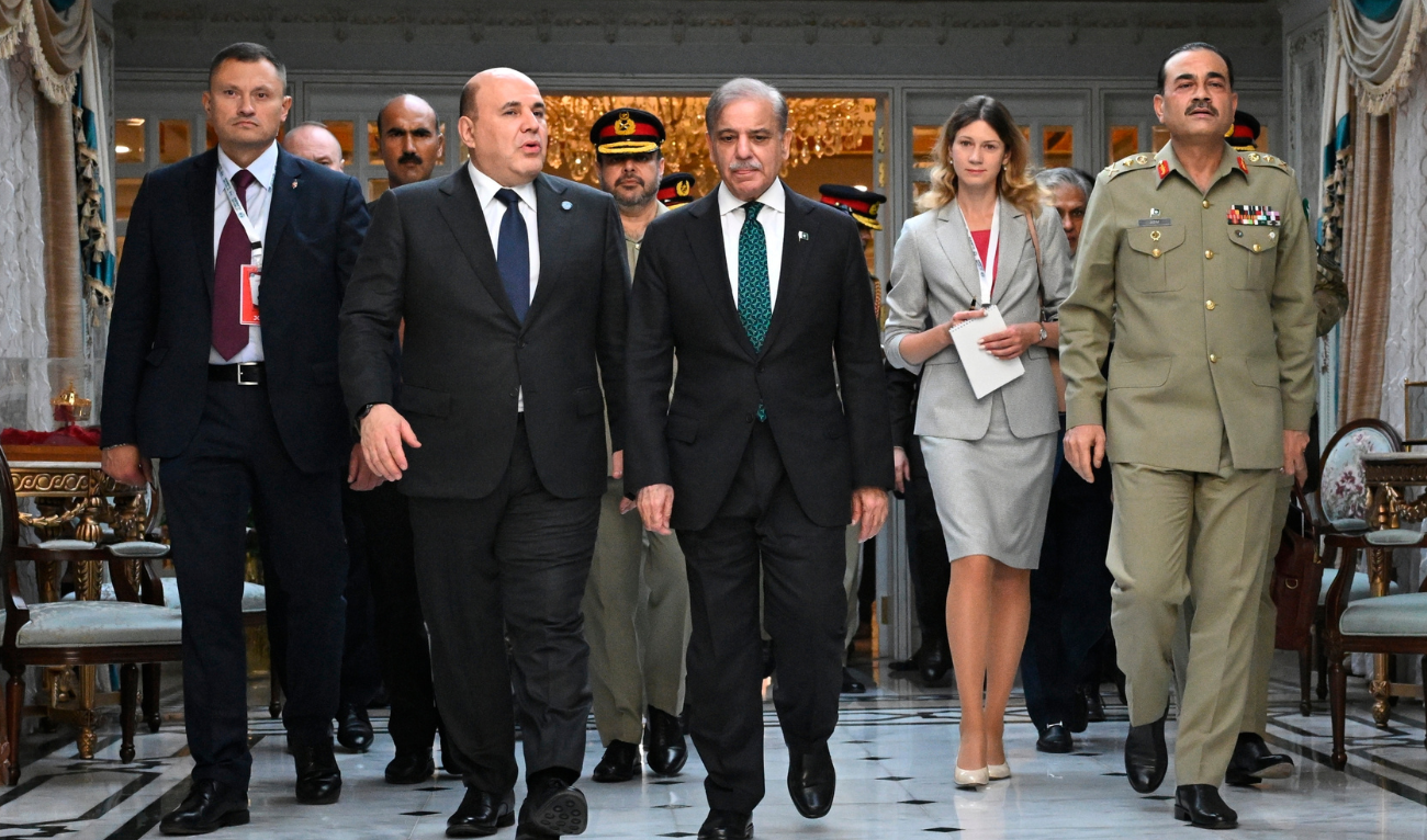 Russian Prime Minister Mikhail Mishustin, 2nd left, and Pakistani Prime Minister Shehbaz Sharif, 3rd left, walk prior to their meeting on the sidelines of Shanghai Cooperation Organization (SCO) Council of Heads of Governments Summit in Islamabad, Pakistan, Wednesday, Oct. 16, 2024. (Alexander Miridonov, Sputnik, Government Pool Photo via AP)