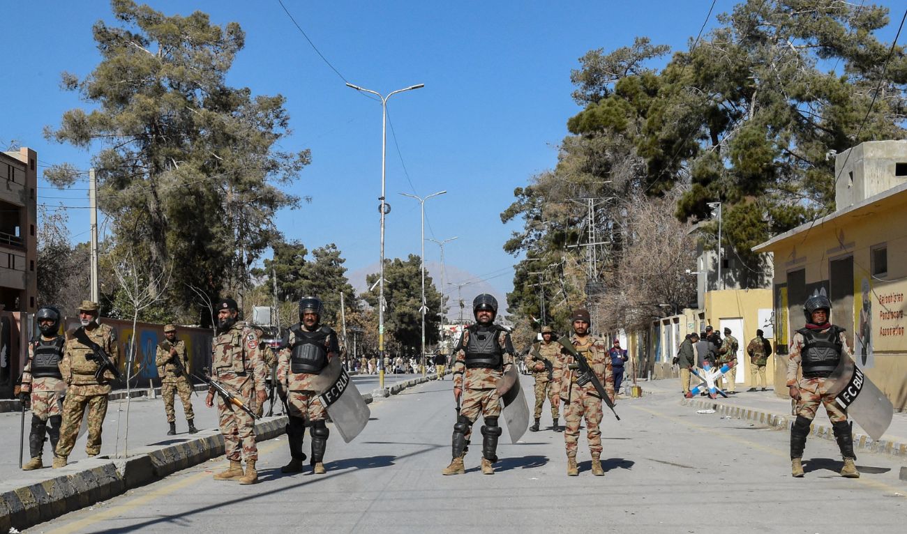 Frontier Corps Balochistan (North) personnel stand guard during a protest oustside the office of a Returning Officer in Quetta on February 9, 2024. (AFP/File)