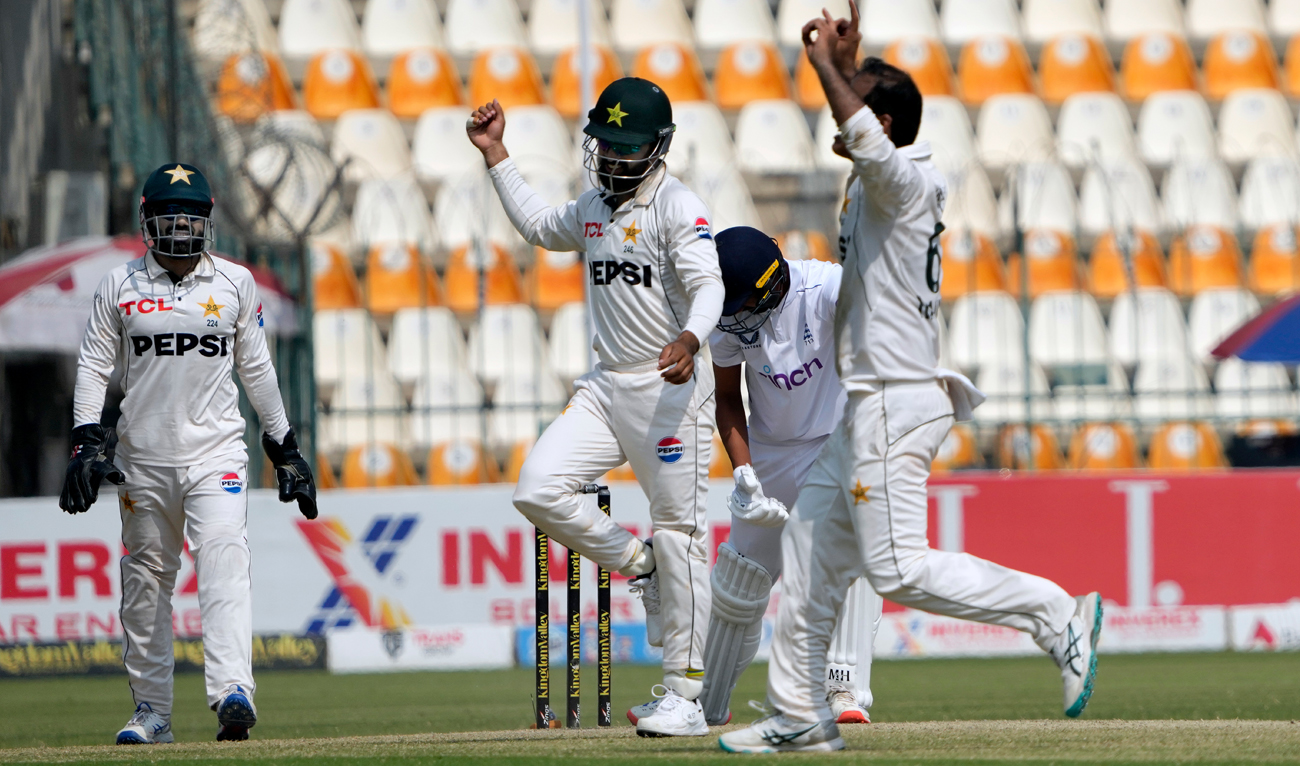 Pakistan’s Noman Ali, right, and teammates celebrates after winning the second test cricket match against England, in Multan on October 18, 2024. (AP/File)