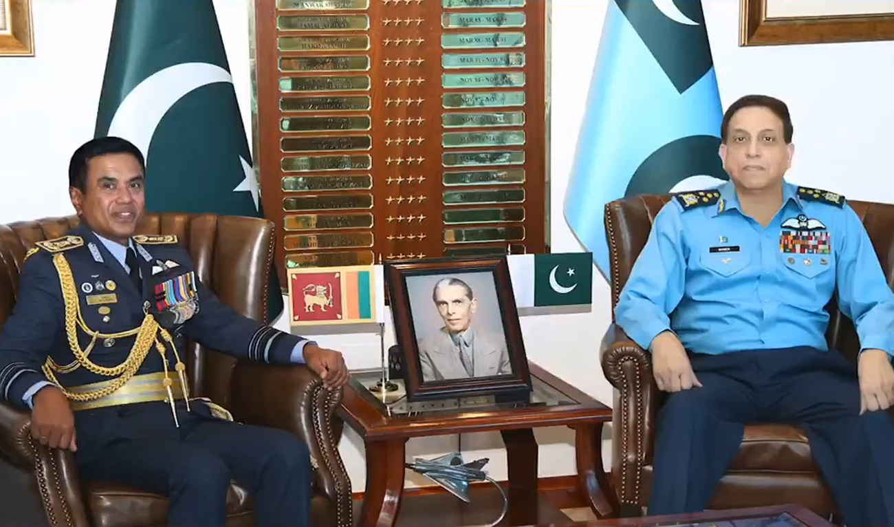 In this screengrab, taken from a handout video released by Pakistan Air Force on October 25, 2024, Pakistan Air Force (PAF) Chief Air Chief Marshal Zaheer Ahmed Baber Sidhu gestures during a meeting with Air Marshal Rajapaksa Appuhamilage Udeni Priyadarshana Rajapaksa, commander of the Sri Lankan Air Force, at the PAF Headquarters in Islamabad. (Photo courtesy: PAF)