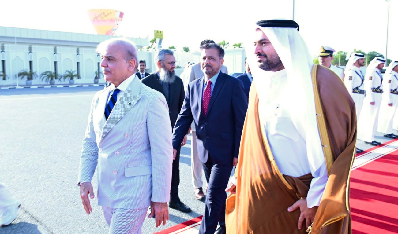 Prime Minister Shehbaz Sharif is received by Qatar's Minister of State, Muhammad bin Abdulaziz Al-Khulaifi, upon arrival at Doha International Airport on October 30, 2024. (PMO)