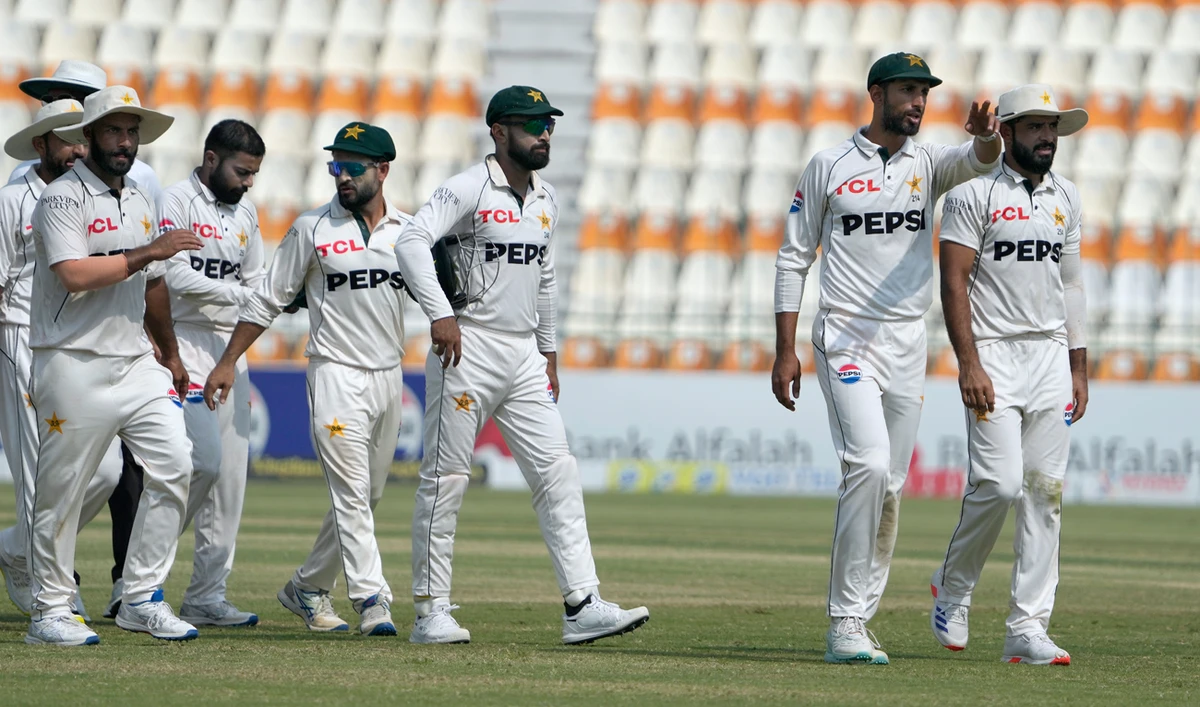 Pakistan’s Shan Masood, second right, and teammates walk off the field after winning the second test cricket match against England, in Multan on October 18, 2024. (AP)