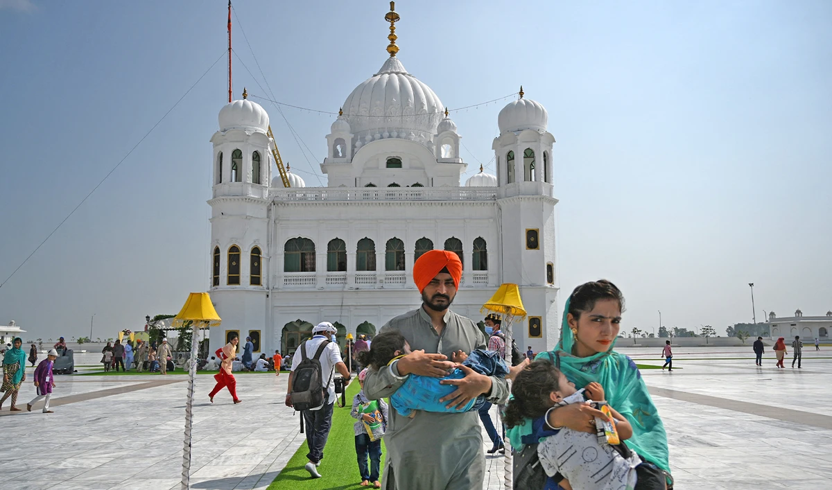 Sikh pilgrims arrive to take part in a religious ritual on the occasion of the 481st death anniversary of Baba Guru Nanak Dev Ji, the founder of Sikhism, at the Gurdwara Darbar Sahib in Kartarpur near the India-Pakistan border on September 22, 2020. (AFP/File)