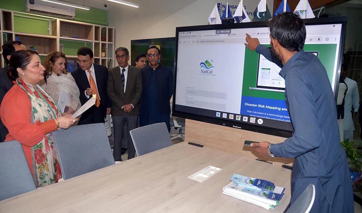 Pakistan PM’s aide on Climate Change Romina Khurshid Alam (left) takes brief on the G-Tech Hub initiative at the NUST Islamabad campus in Islamabad on October 25, 2024. (APP)