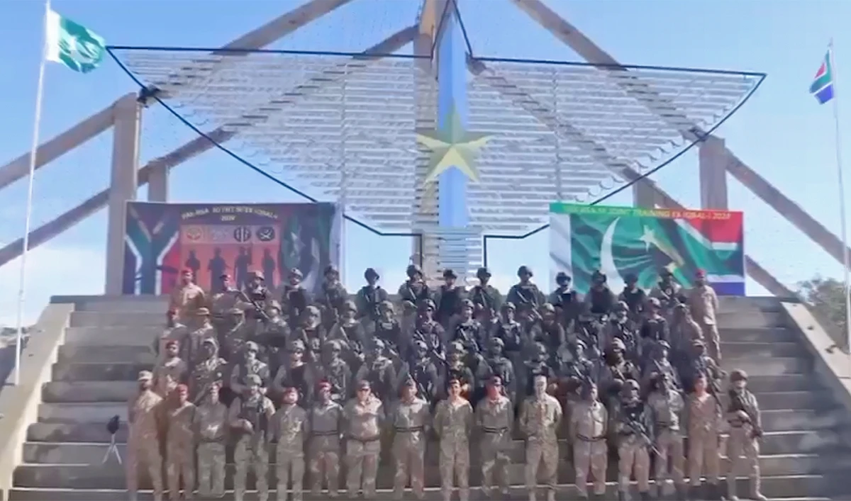 The screengrab taken from a video shared by ISPR on October 28, 2024, shows armies of South Africa and Pakistan posing for a group photograph after the conclusion of a two-week joint counter-terrorism exercise in the northwestern hill station of Cherat. (Pakistan Army)