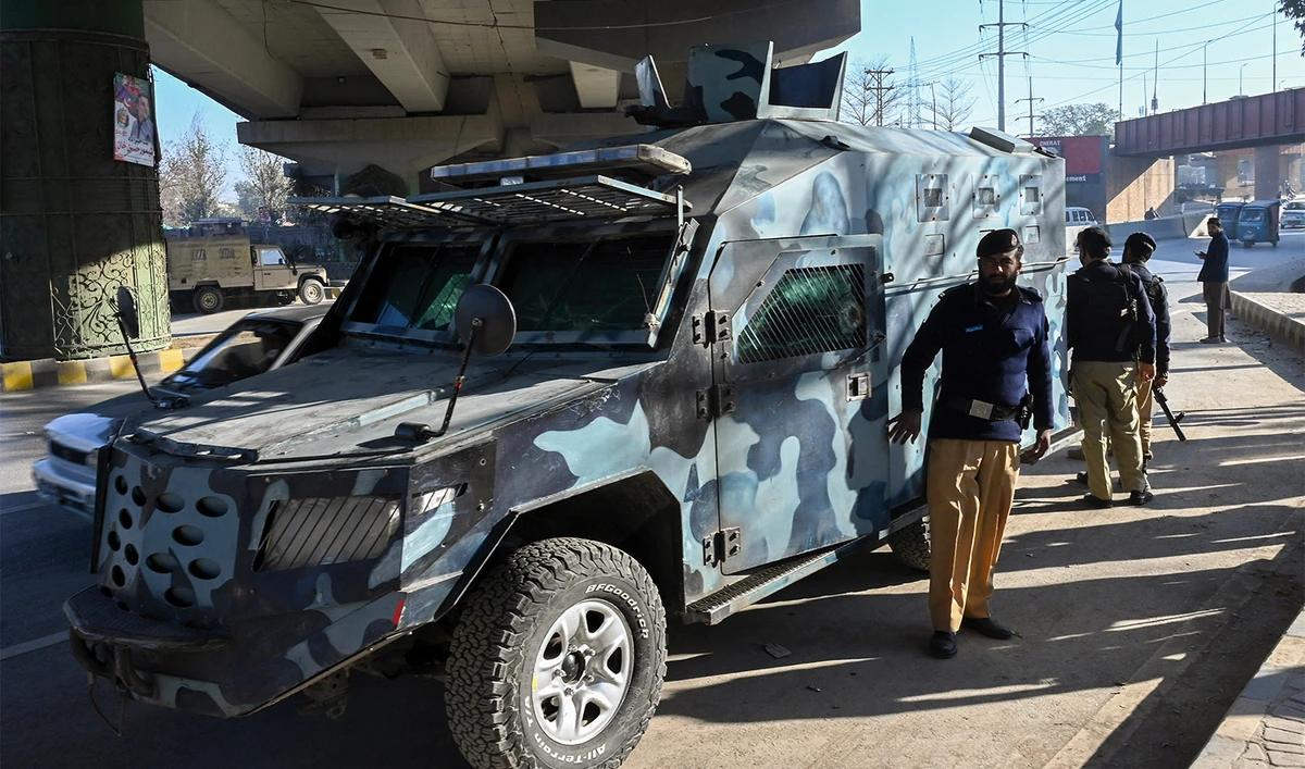 Police stand guard in Peshawar on February 9, 2024. (AFP/File)