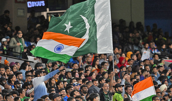 Pakistan and Indian fans wave their national flags during the ICC men's Twenty20 World Cup 2022 cricket match between India and Pakistan at Melbourne Cricket Ground (MCG) in Melbourne on October 23, 2022. (AFP/File)