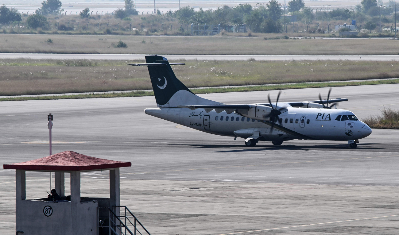 Pakistan International Airlines (PIA) ATR aircraft arrives at the Islamabad International Airport in Islamabad on October 31, 2024. (AFP)