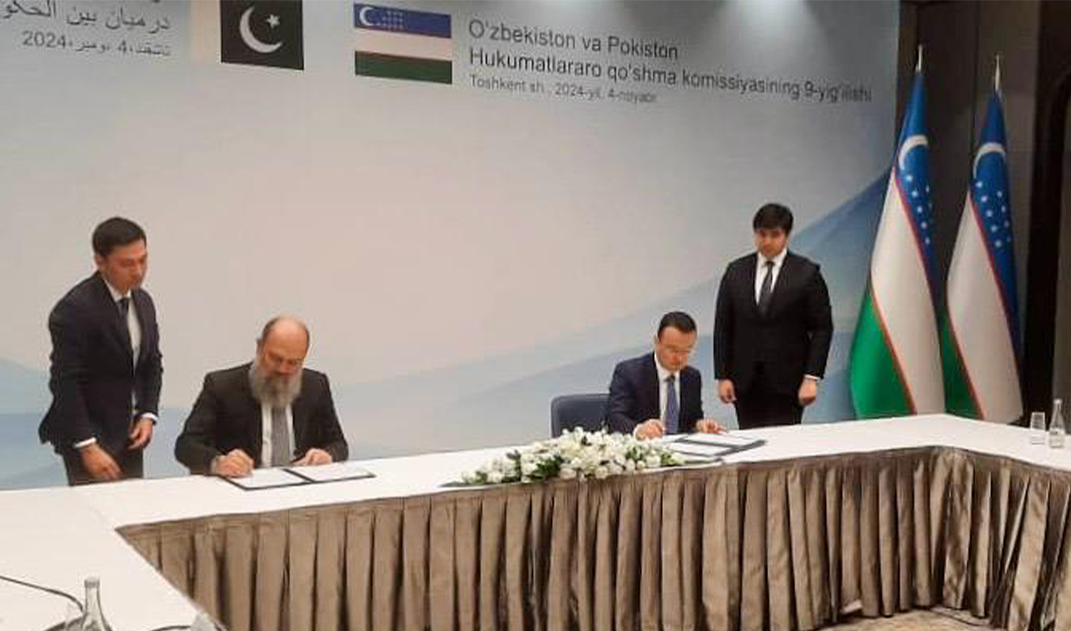 Pakistan’s Minister for Commerce, Jam Kamal Khan (left), and Uzbekistan’s Minister of Investment, Industry, and Trade, Laziz Kudratov (right), sign protocol and MoU on e-Commerce at the 9th Session of the Uzbekistan-Pakistan Inter-Governmental Commission in Tashkent on November 4, 2024. (Pakistan Commerce Ministry)