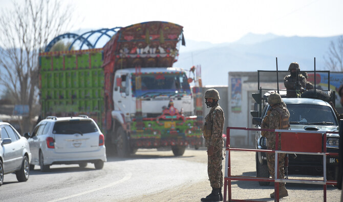 In this file photo, taken on January 27, 2019, Pakistani army soldiers stand guard at a check point in Miran Shah, a town in North Waziristan, near the border between Pakistan and Afghanistan. (AFP/File)