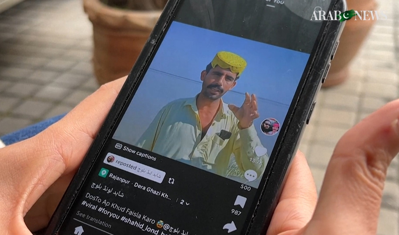 This screengrab, taken on November 9, 2024, shows a person watching a video of Bandit Shahid Lund Baloch on TikTok. (Screengrab via YouTube/File)