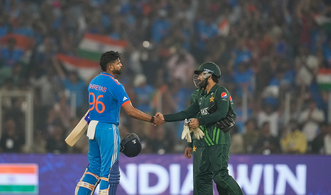 India's Shreyas Iyer shakes hands with Pakistan's Mohammad Rizwan following India's win in the ICC Men's Cricket World Cup match between India and Pakistan in Ahmedabad, India, on October 14, 2023. (AP/File)