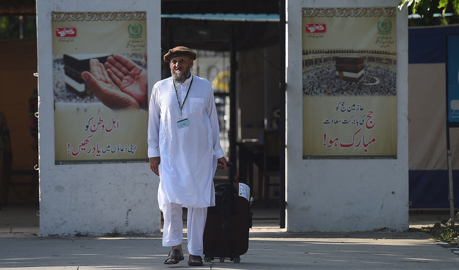 A Pakistani Hajj pilgrim arrives at The Hajj Complex in Islamabad on August 23, 2016, before leaving for the annual Hajj pilgrimage to the Islamic holy cities of Makkah and Madinah in Saudi Arabia. (AFP/File)