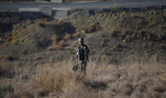 A Pakistani army soldier stands guard near a border terminal in Ghulam Khan, a town in North Waziristan, on the border between Pakistan and Afghanistan, on January 27, 2019. (AFP/File)