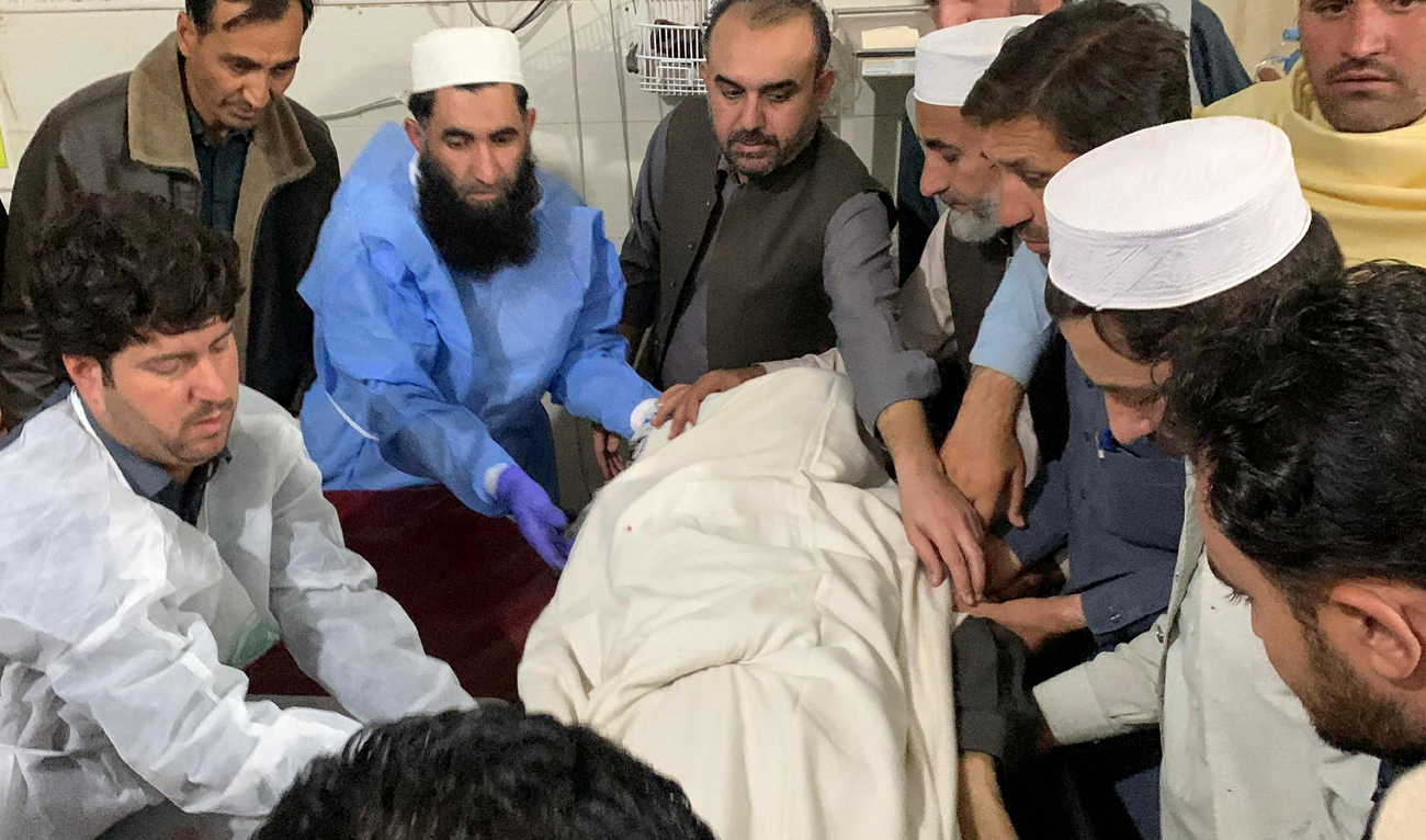 Mourners carry the dead body of Jamaat-e-Islami leader Sufi Hameed who was killed by Daesh group Khorasan branch (IS-K) in Bajaur district of Khyber Pakhtunkhwa province on November 14, 2024. (AFP)