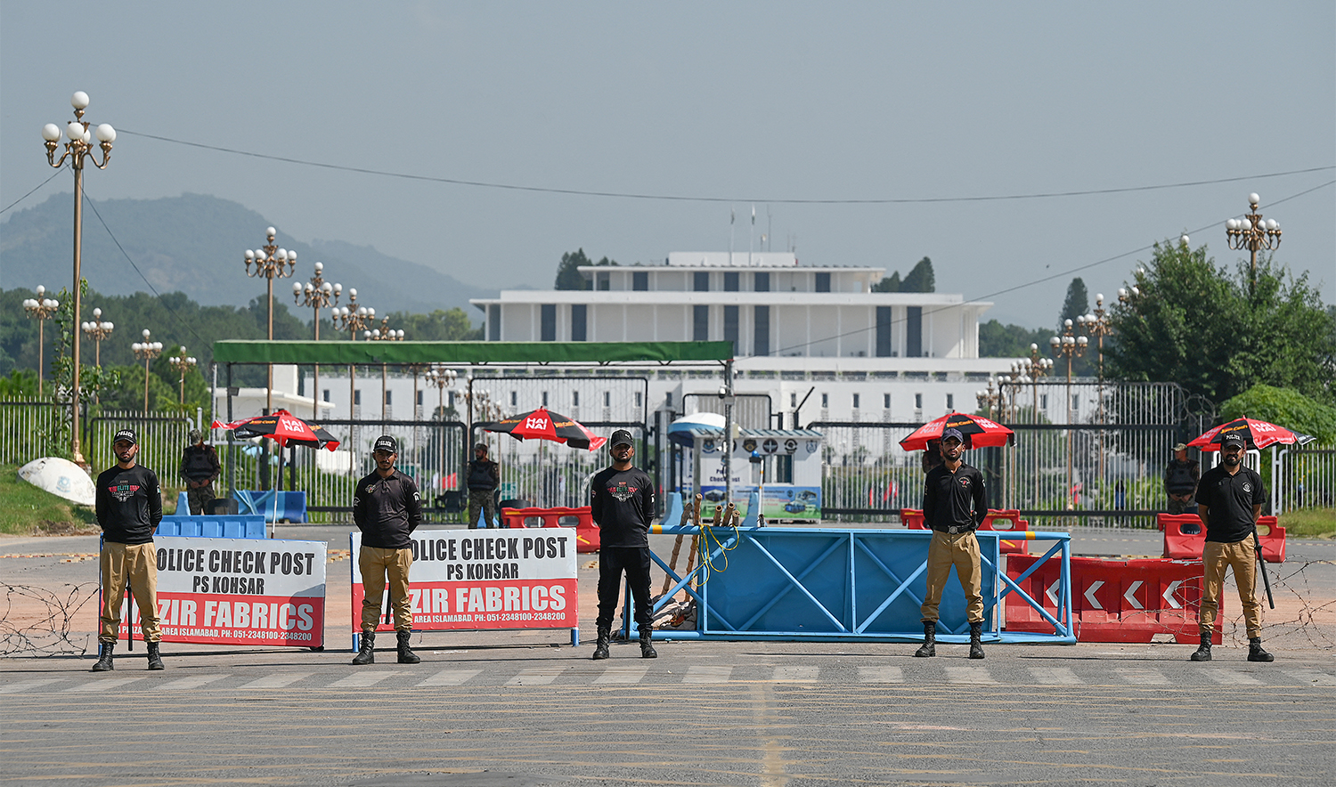 Security personnel stand guard in front of the Presidential Palace ahead of a Shanghai Cooperation Organisation (SCO) summit in Islamabad on October 13, 2024. (AFP/File)