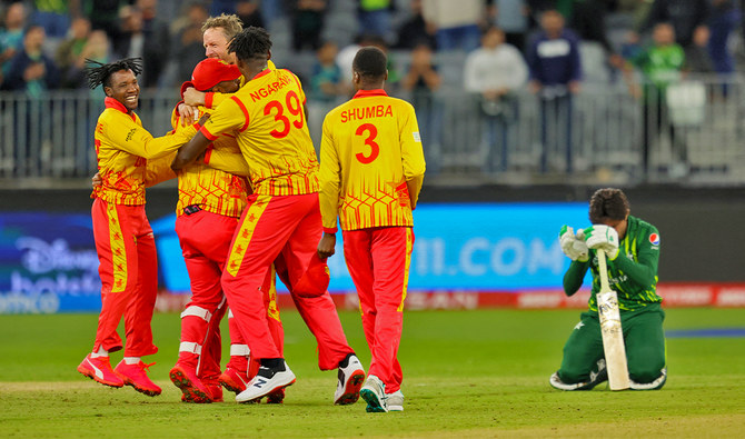 Zimbabwe’s players celebrate their victory as Pakistan’s Mohammad Wasim (R) reacts at the end of the ICC men’s Twenty20 World Cup 2022 cricket match between Pakistan and Zimbabwe in Perth, Australia, on October 27, 2022. (AFP/File)