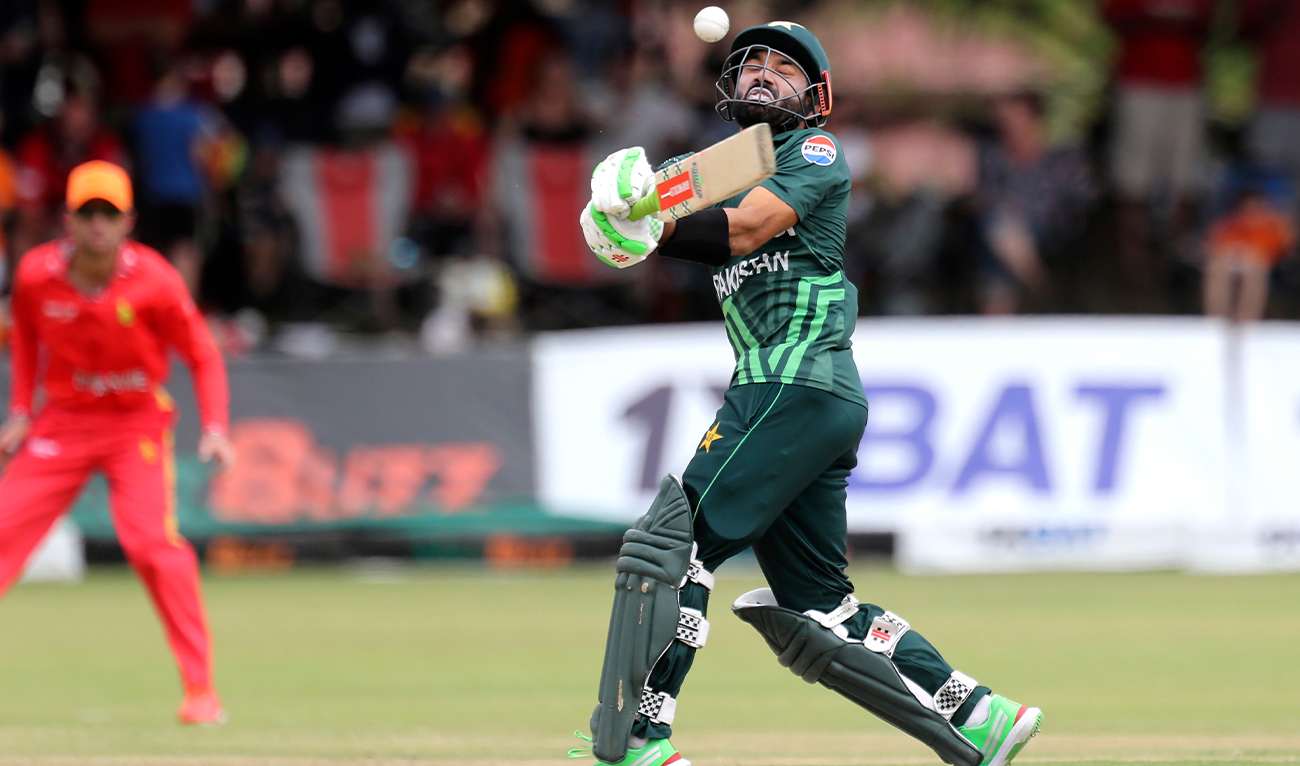 Pakistan’s captain Mohammad Rizwan plays a ball during the first ODI cricket match against Zimbabwe at Queens Sports Club in Bulawayo, Zimbabwe, on November 24, 2024. (AP)