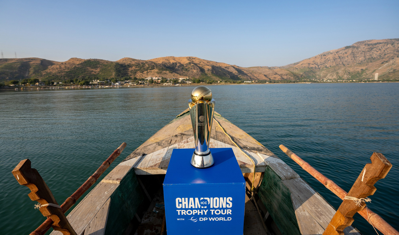 This handout photo, taken and released by the Pakistan Cricket Board on November 18, 2024, shows ICC Champions Trophy 2025 during the trophy tour at the Khanpur Dam in Islamabad. (Photo courtesy: PCB/File)