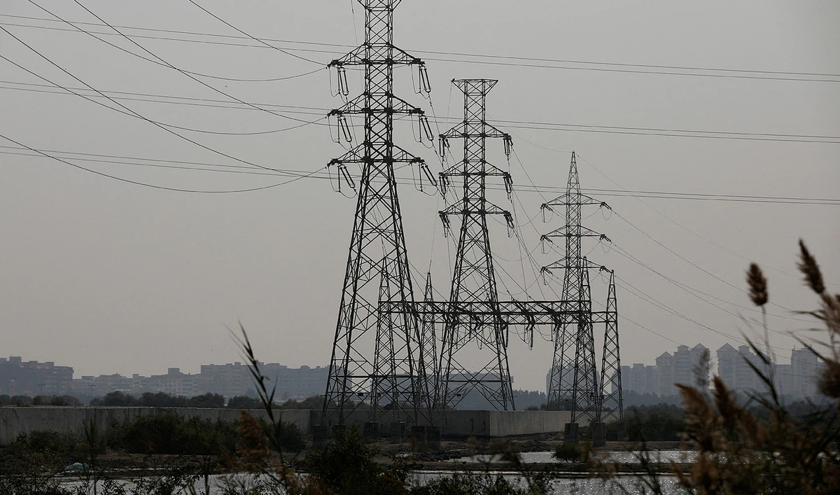 This file photo, taken on January 24, 2023, shows a power transmission tower in Karachi. (REUTERS/File)