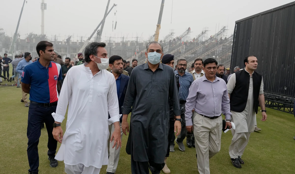 Pakistan Interior minister and Chairman of Pakistan Cricket Board Mohsin Naqvi (C) visits to review upgradation work at the Qaddafi Stadium in preparation for upcoming ICC Champions Trophy 2025 in Lahore on November 8, 2024. (AP/File)