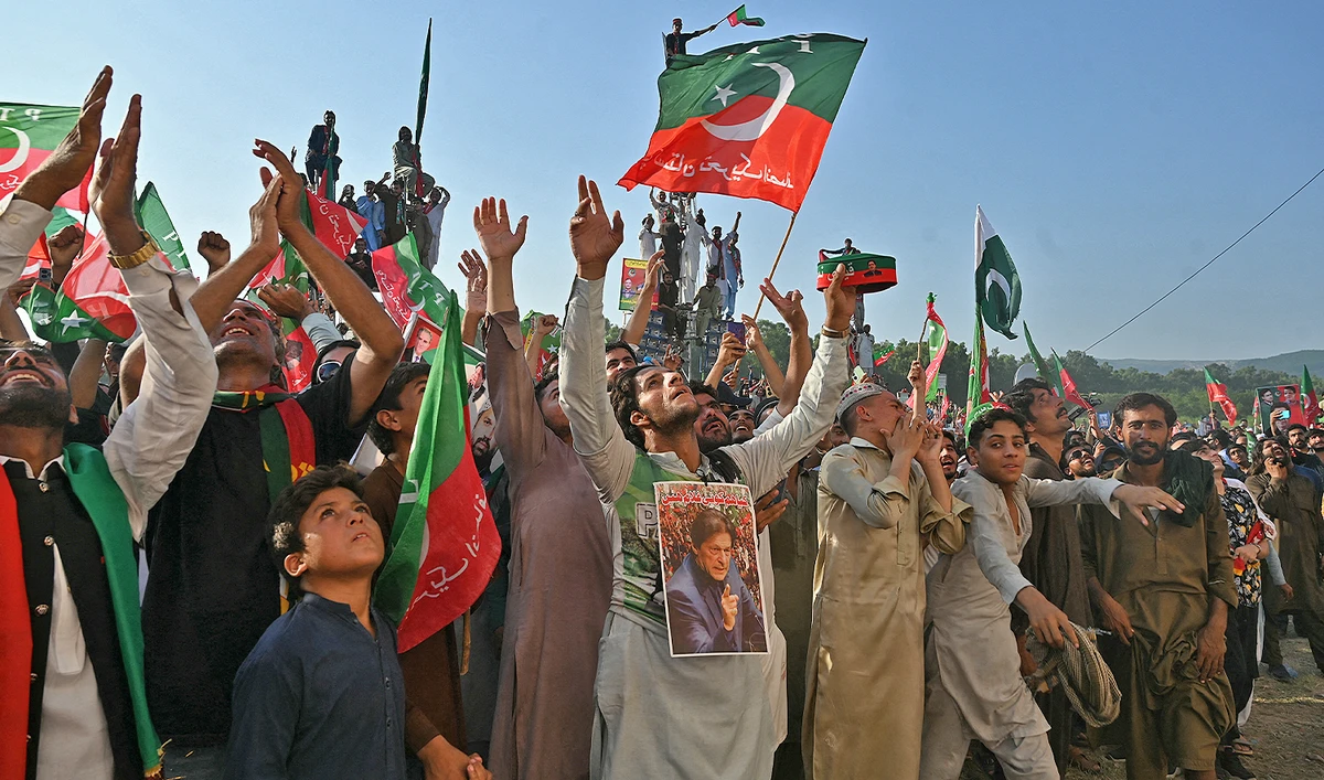 Activists of Pakistan Tehreek-e-Insaf (PTI) party of former country’s prime minister Imran Khan, take part in a public rally on the outskirts of Islamabad on September 8, 2024. (AFP/File)