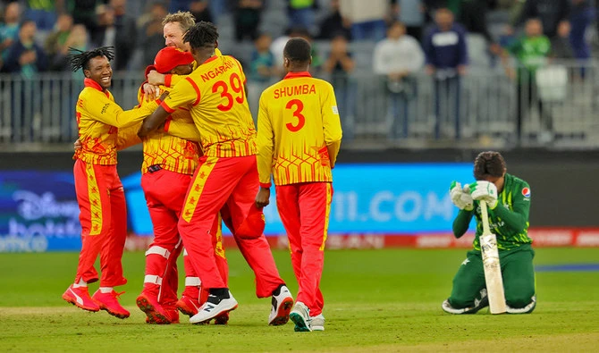 Zimbabwe’s players celebrate their victory as Pakistan’s Mohammad Wasim (R) reacts at the end of the ICC men’s Twenty20 World Cup 2022 cricket match between Pakistan and Zimbabwe in Perth, Australia, on October 27, 2022. (AFP/File)