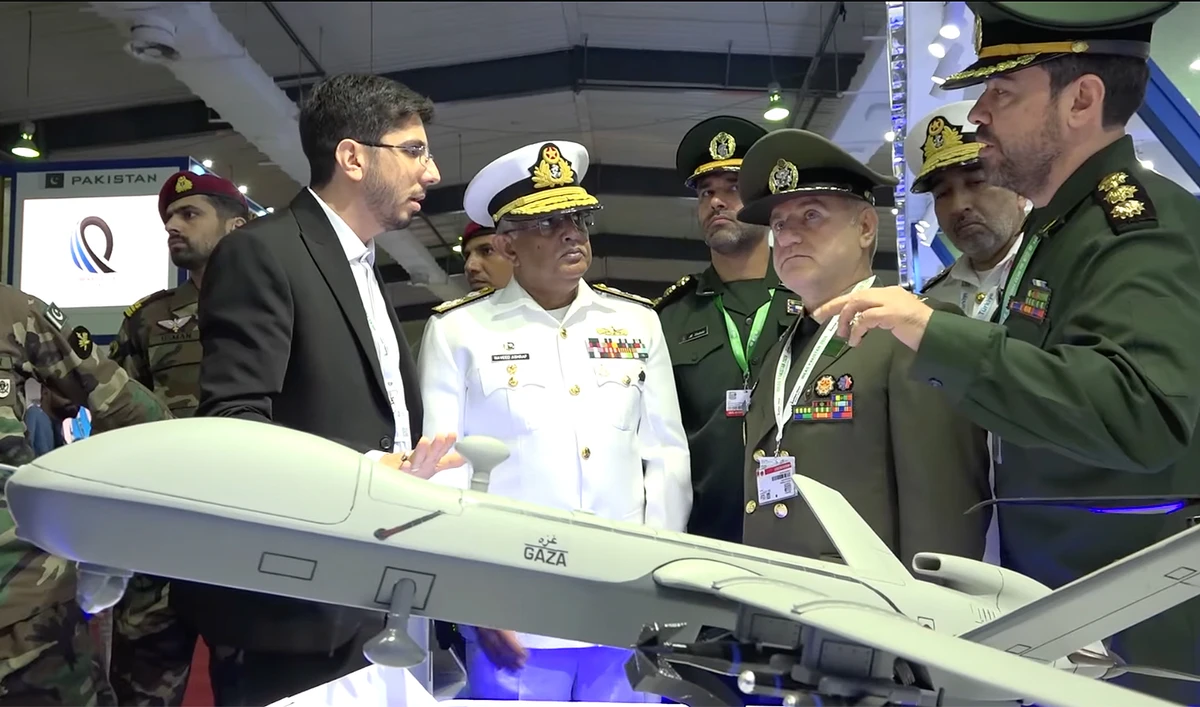Pakistan Navy Chief Admiral Naveed Ashraf (second from left) is being briefied at International Defense Exhibition and Seminar (IDEAS) exhibition in Karachi, Pakistan, on November 20, 2024. (Pakistan Navy)