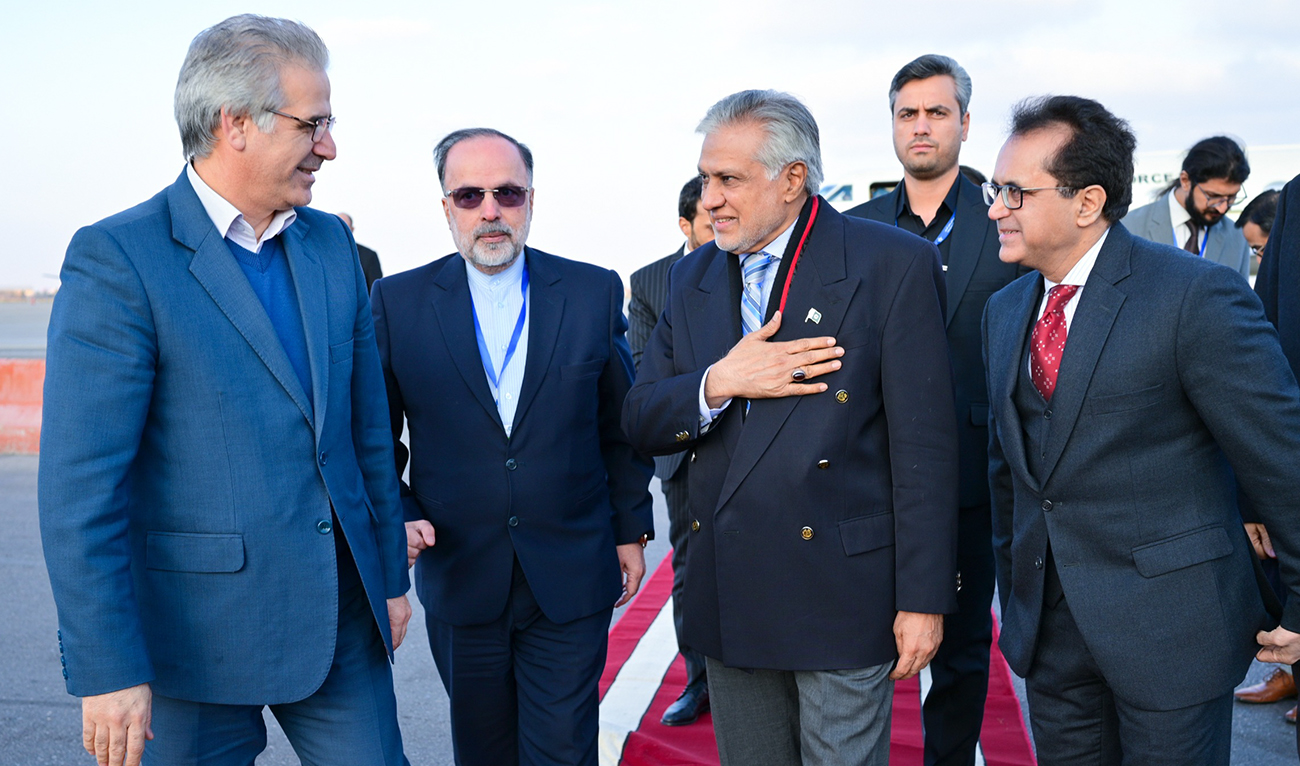 Pakistan’s Deputy Prime Minister Ishaq Dar (2R) arrives in Mashhad, Iran on December 2, 2024, to attend the 28th Meeting of the ECO Council of Ministers. (Photo courtesy: MOFA)