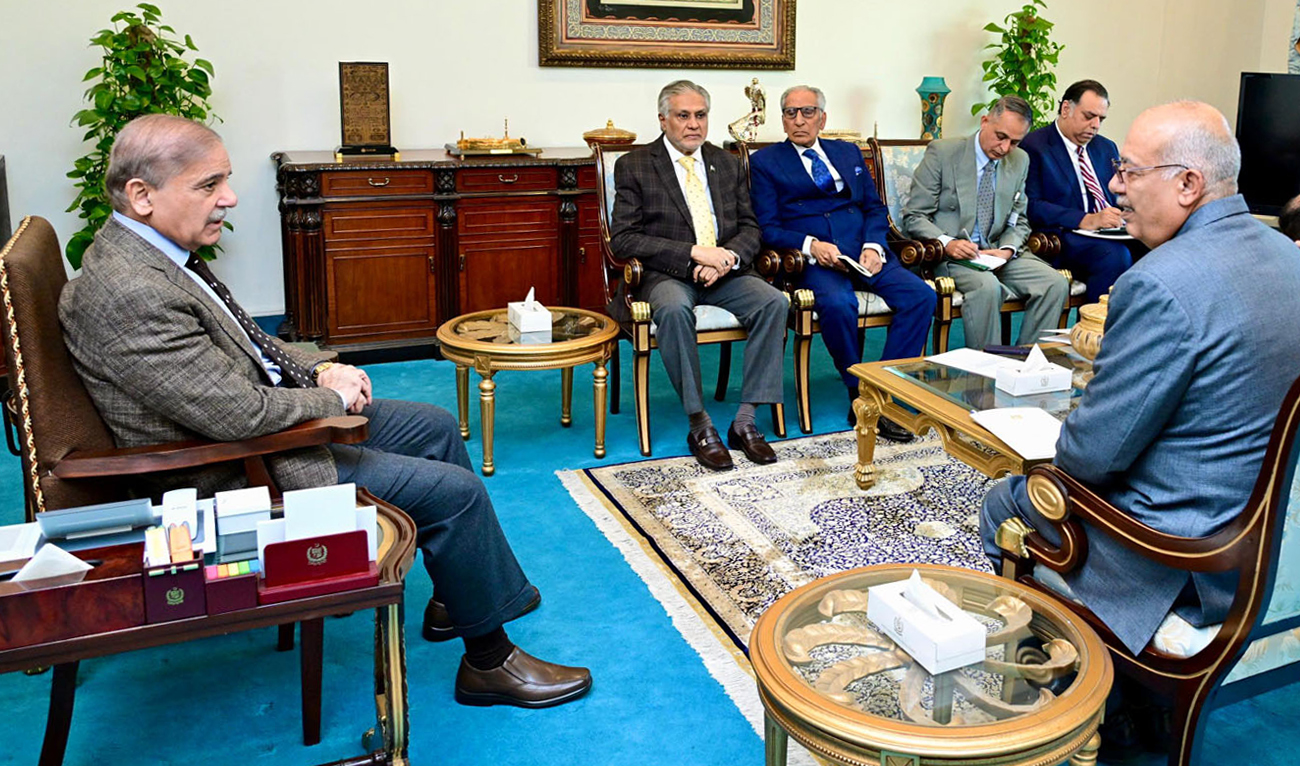 This handout photograph shows Prime Minister Shehbaz Sharif (left) meeting with the Ambassador of Palestine to Pakistan, Dr. Zubair Mohammad Hamadallah Zaid (right) in Islamabad on December 5, 2024. (PID)
