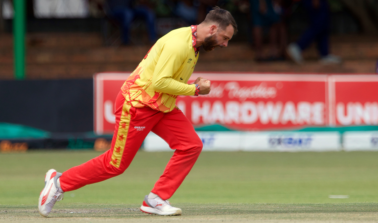 Zimbabwe’s Ryan Burl celebrates a wicket during the third T20 cricket match between Zimbabwe and Pakistan at Queens Sports Club in Bulawayo, Zimbabwe, on December 5, 2024. (AP)