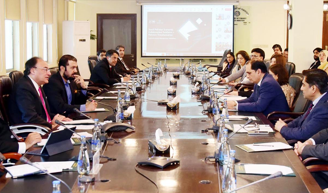 Pakistan’s finance minister, Muhammad Aurangzeb (sitting left), virtually attends the 1st workshop on “Implementation Management,” organized by the Kingdom of Saudi Arabia here in Islamabad, Pakistan, on December 5, 2024. (PID)