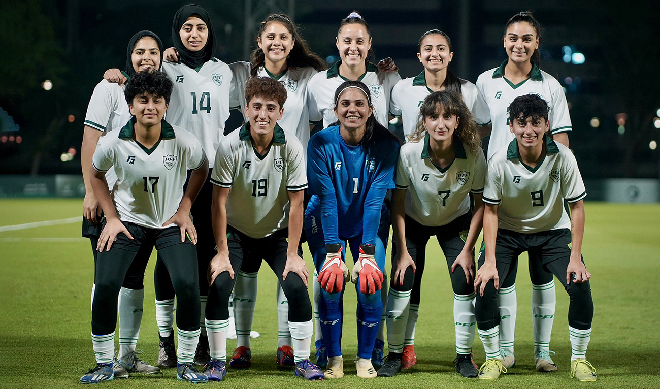 Pakistan women’s national football team players pose for a picture before the match against Saudi Arabia in Doha, Qatar, on December 7, 2024. (Photo Courtesy: X@TheRealPFF)