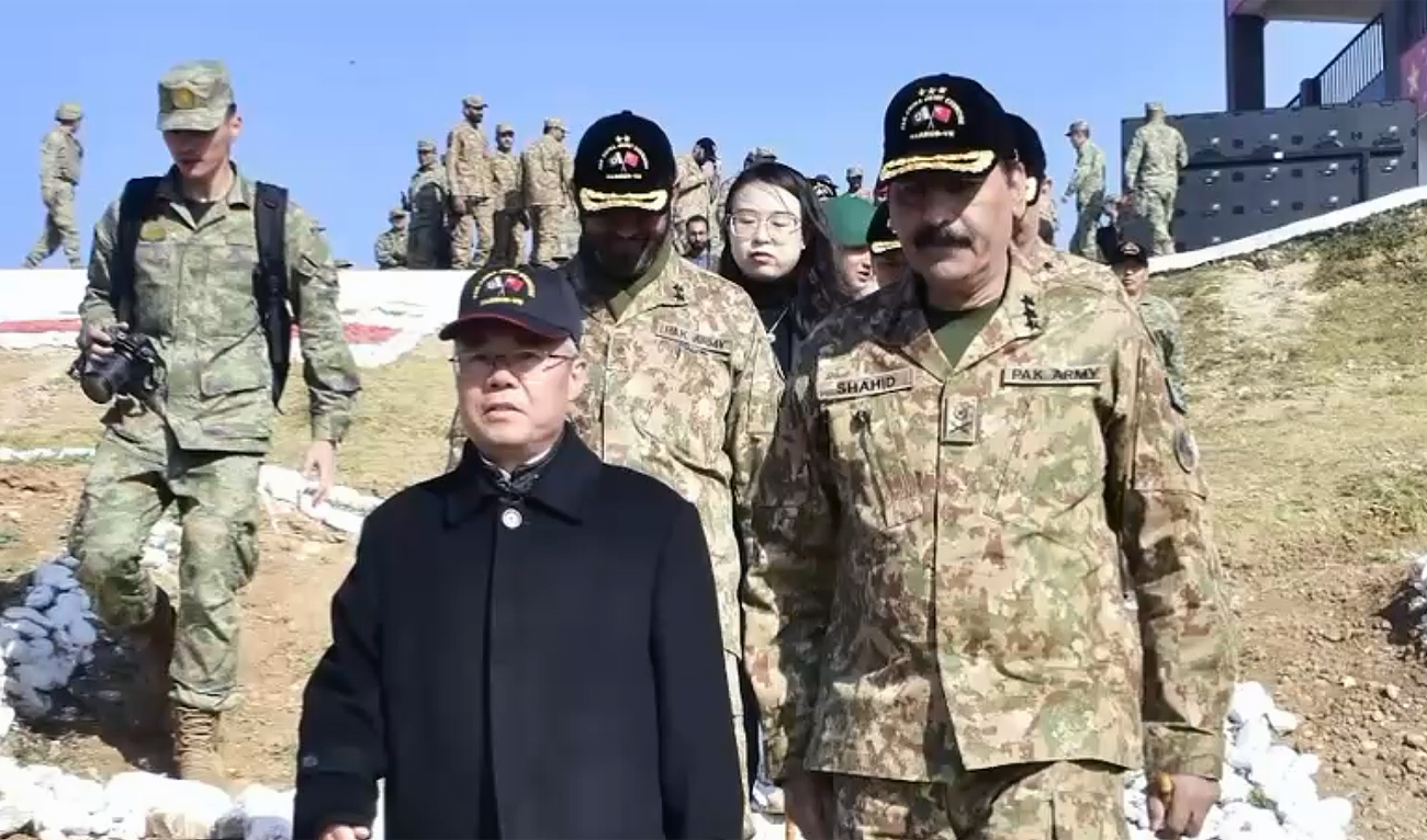 The screengrab taken from a video shared by Inter-Services Public Relations (ISPR) shows Rawalpindi Corps Commander Lt. Gen. Shahid Imtiaz (right) with Chinese Ambassador to Pakistan Jiang Zaidong (left) at the Distinguished Visitor’s Day ceremony of Pakistan-China joint counter-terrorism exercise ‘Warrior-VIII,’ held at the Tilla Field Firing Range in Jhelum district, Pakistan, on December 10, 2024. (ISPR)