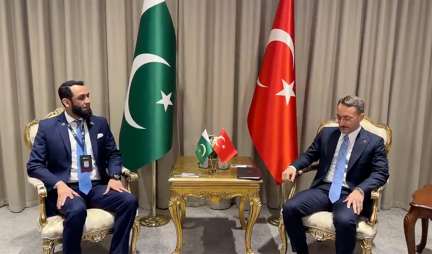 Pakistan’s Information Minister Ataullah Tarar (left) and Turkiye’s Head of Communications Professor Fahrettin Altun hold a meeting at the Turkish Presidency in Ankara on December 13, 2024. (@TararAttaullah/X)