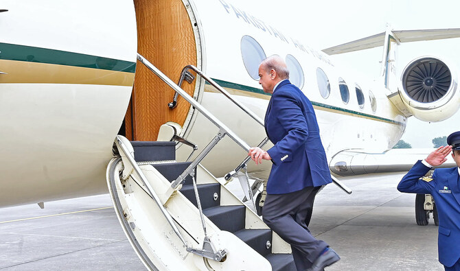 Pakistan Prime Minister Shehbaz Sharif boards the plane en route to Saudi Arabia on October 29, 2024. (Government of Pakistan/File)