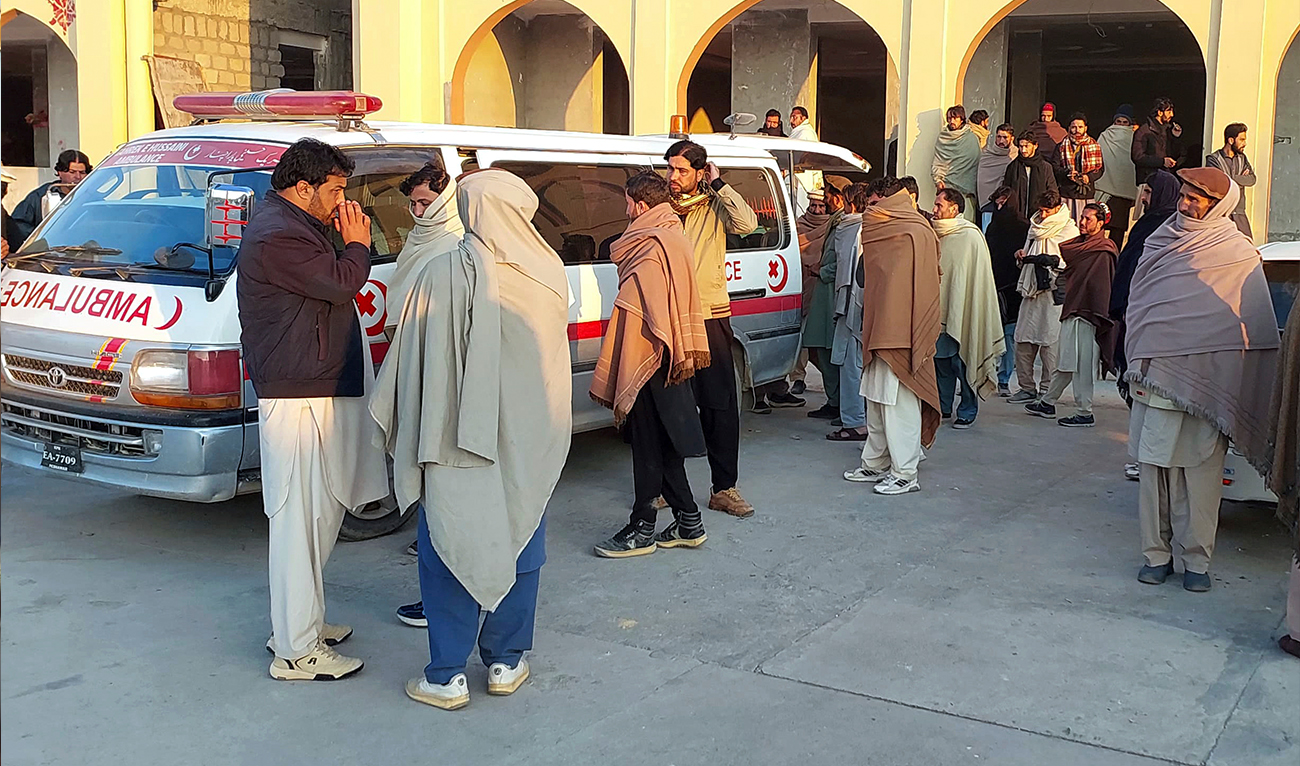 Relatives gather to collect the body of a person from hospital, who was killed in a gunmen firing incident in district Kurram, Pakistan, on November 22, 2024. (AP/File)